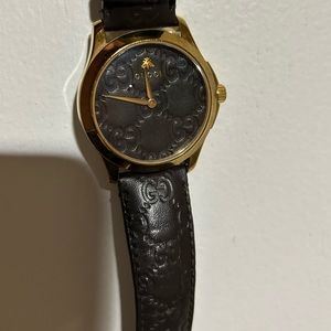 Men’s/woman’s Gucci watch